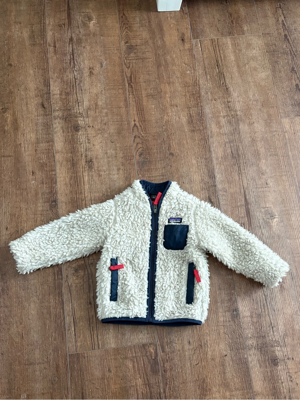 Patagonia Kids Cream Sherpa Jacket with Navy Trim and Red Accents